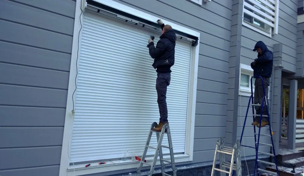 workers installing shutters