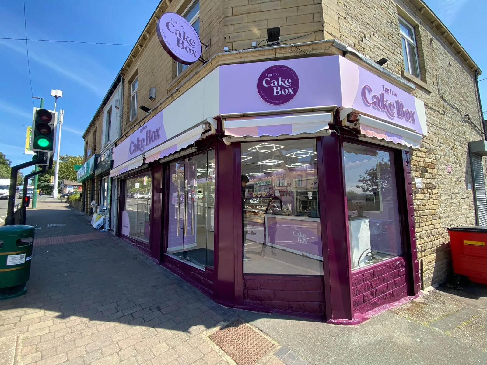 Cake Box shopfront by Direct Shopfront – corner unit with wraparound glazing