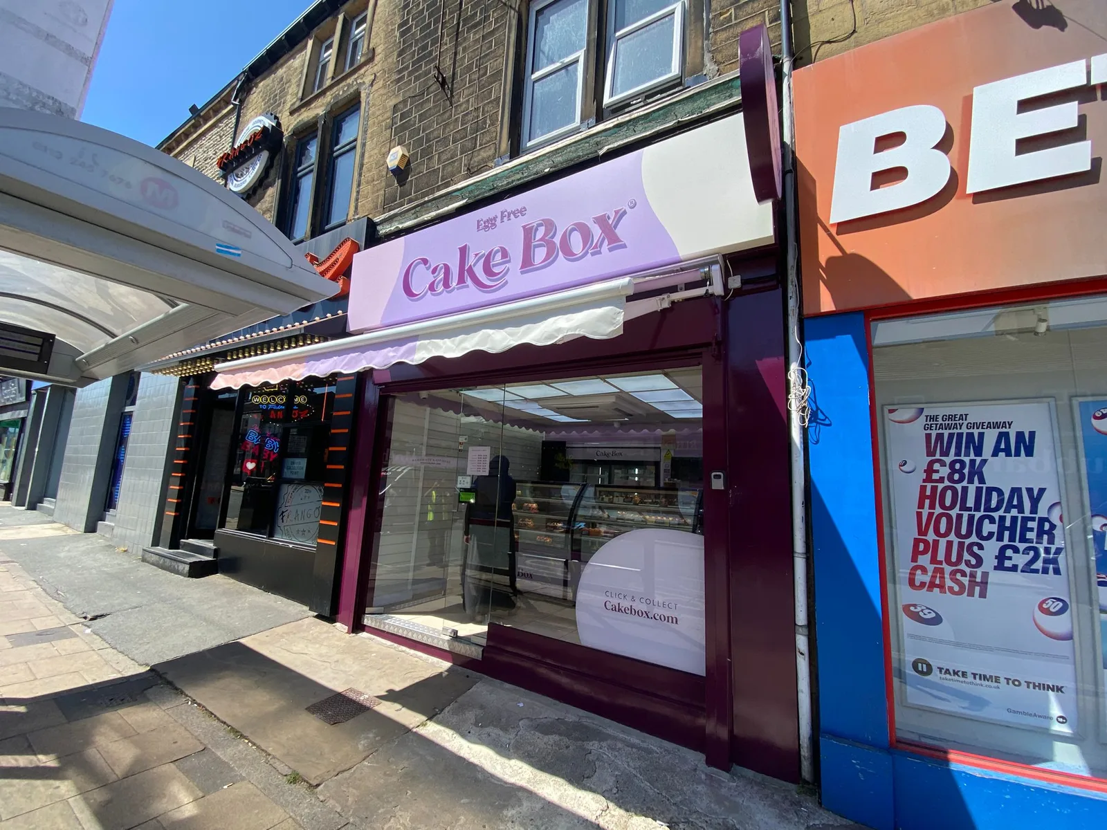 Cake Box shopfront by Direct Shopfront – angled high street view